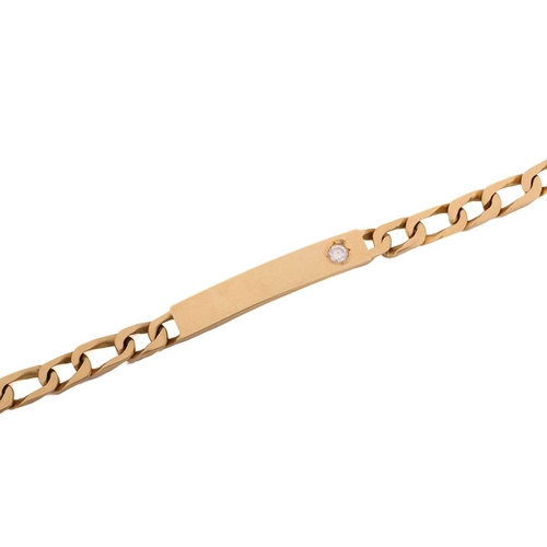 190 - A yellow metal ID bracelet set with a diamond accent, consisting of a flat curb chain attaching a cu... 