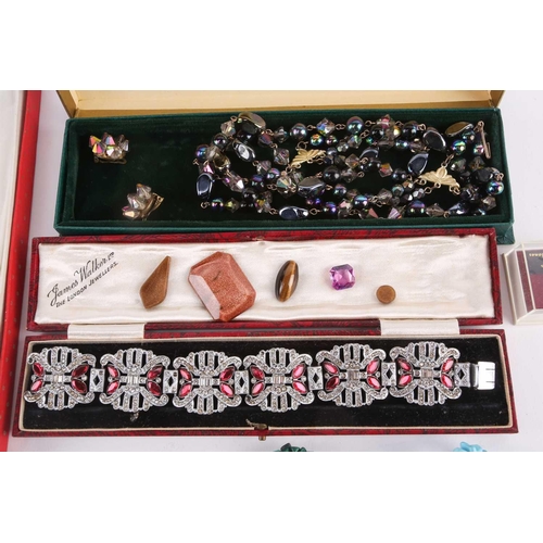 199 - A collection of costume jewellery including an art deco panel style paste panel bracelet, a large co... 