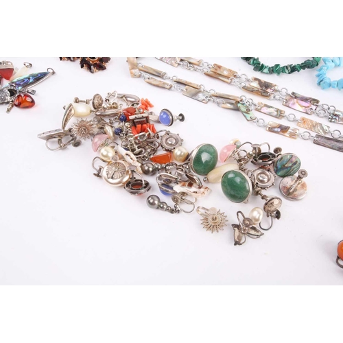 199 - A collection of costume jewellery including an art deco panel style paste panel bracelet, a large co... 