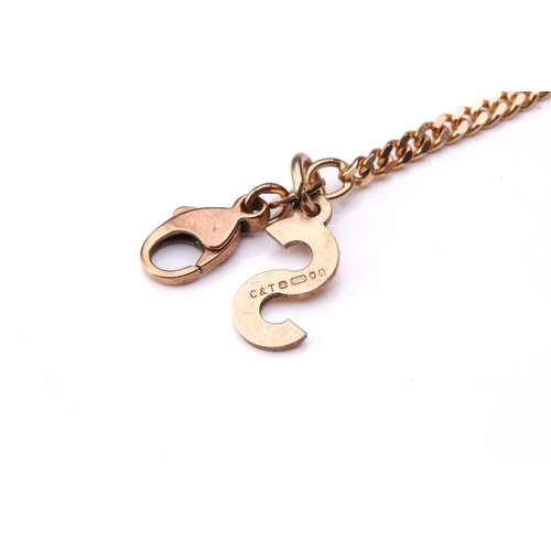 201 - A 9ct gold alphabet pendant on curb link chain, the 'S' charm bears London assay marks, 1979, drop l... 