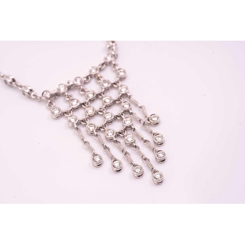 203 - A diamond fringe necklace, the triangular mesh is constructed with collet-set round diamonds, suspen... 