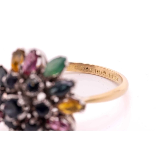 212 - A gem-set flower dome ring, centred with a tiered cluster of circular-cut sapphires, surrounded by a... 