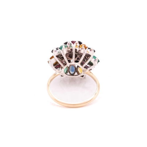 212 - A gem-set flower dome ring, centred with a tiered cluster of circular-cut sapphires, surrounded by a... 