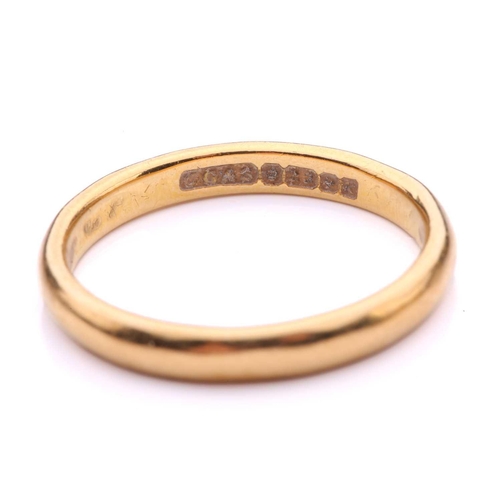 214 - A 22ct yellow gold wedding band and another; the wedding band comprises a plain D-section band, Birm... 