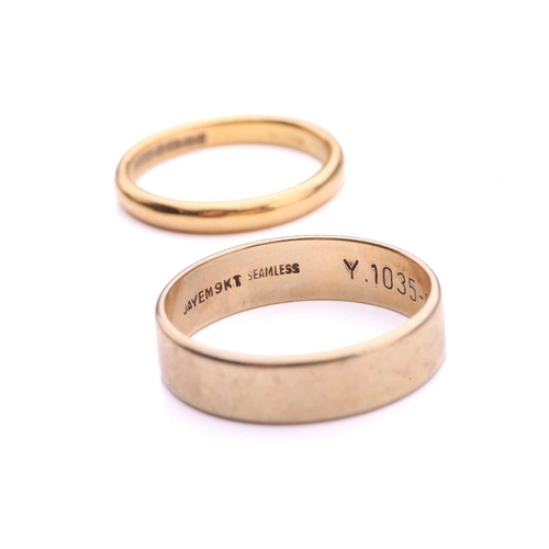 214 - A 22ct yellow gold wedding band and another; the wedding band comprises a plain D-section band, Birm... 