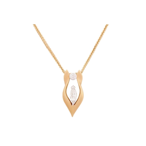 22 - An 18-carat gold and diamond pendant. with a marquise cut diamond measuring 7.0 x 2.8 mm with a roun... 