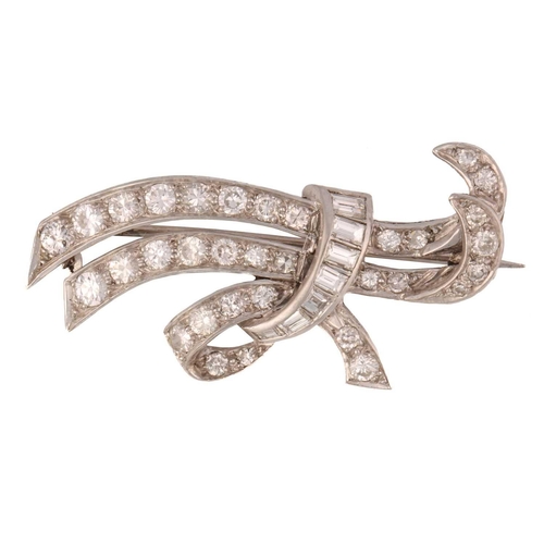 224 - A Mid-20th-century diamond brooch in the form of a stylised ribbon, comprising circular-cut and cali... 