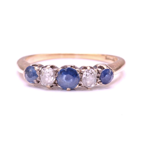 226 - A Sapphire and old-cut Diamond five-stone ring, set with a central round Sapphire flanked by two old... 