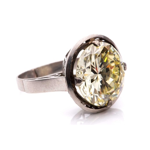 227 - A diamond solitaire ring, featuring a light yellow round brilliant-cut diamond of 8.62ct, mounted in... 