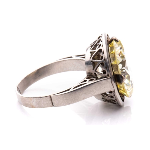 227 - A diamond solitaire ring, featuring a light yellow round brilliant-cut diamond of 8.62ct, mounted in... 