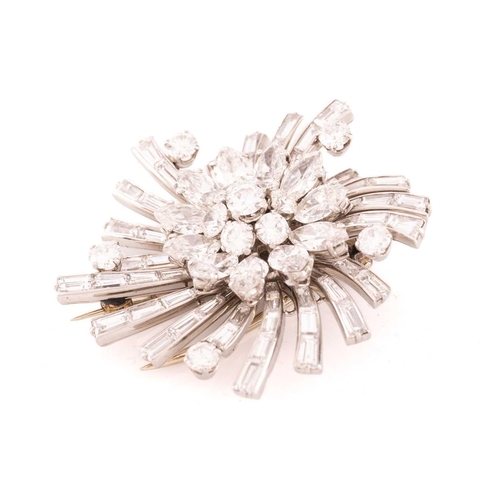 233 - Van Cleef & Arpels - A floral spray brooch set with diamonds, circa 1950, featuring a cluster of tie... 