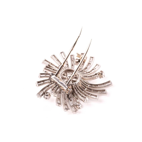 233 - Van Cleef & Arpels - A floral spray brooch set with diamonds, circa 1950, featuring a cluster of tie... 