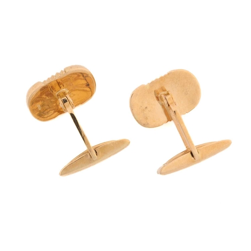 235 - A pair of oblong cufflinks, with reeded details at the centre, fitted with triangular cufflink swive... 