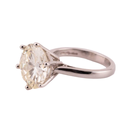 254 - A diamond solitaire ring in platinum, featuring a round brilliant-cut diamond of 6.51ct, mounted in ... 