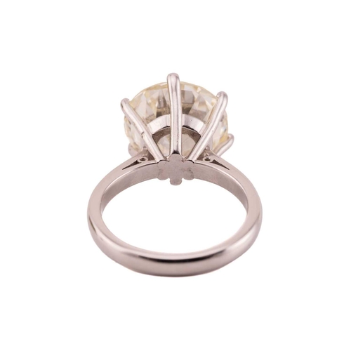 254 - A diamond solitaire ring in platinum, featuring a round brilliant-cut diamond of 6.51ct, mounted in ... 