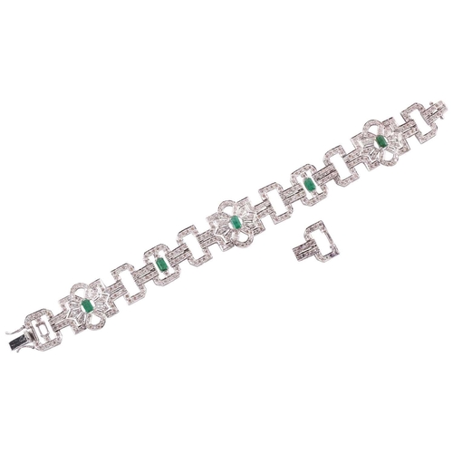 26 - An Art Deco-style emerald and diamond bracelet, designed as geometric openwork links, encrusted with... 