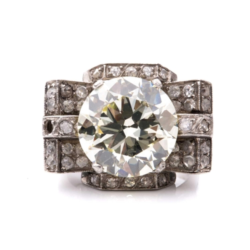 270 - An Art Deco style diamond cocktail ring, scintillating with a light yellow round brilliant-cut diamo... 