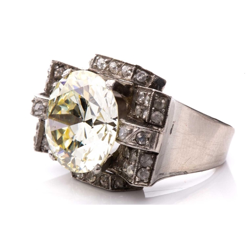 270 - An Art Deco style diamond cocktail ring, scintillating with a light yellow round brilliant-cut diamo... 