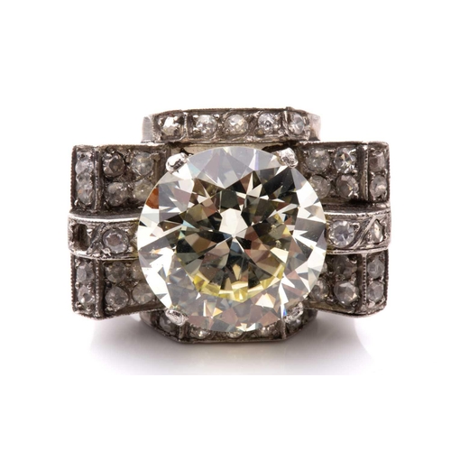 270 - An Art Deco style diamond cocktail ring, scintillating with a light yellow round brilliant-cut diamo... 