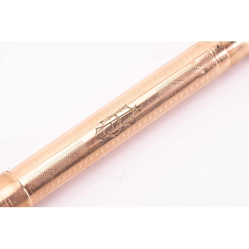 275 - A Mabie Todd & Co 'Swan' 9k gold fountain pen, circa 1925, with engine turned decoration, the body w... 