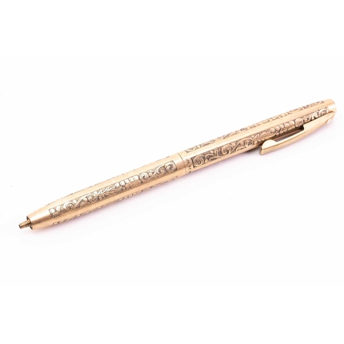 275 - A Mabie Todd & Co 'Swan' 9k gold fountain pen, circa 1925, with engine turned decoration, the body w... 