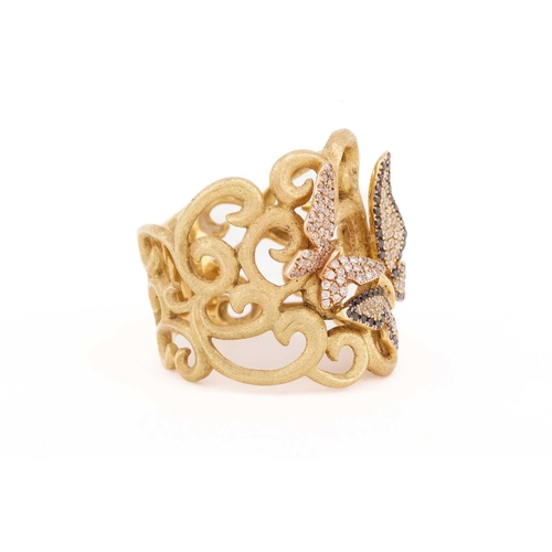 3 - A diamond butterfly design dress ring, the satin finish yellow gold scrollwork mount accented with t... 