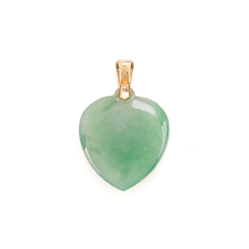 35 - A heart-shaped jade pendant, in dull grey-ish green colour and sub-translucency, approximately measu... 