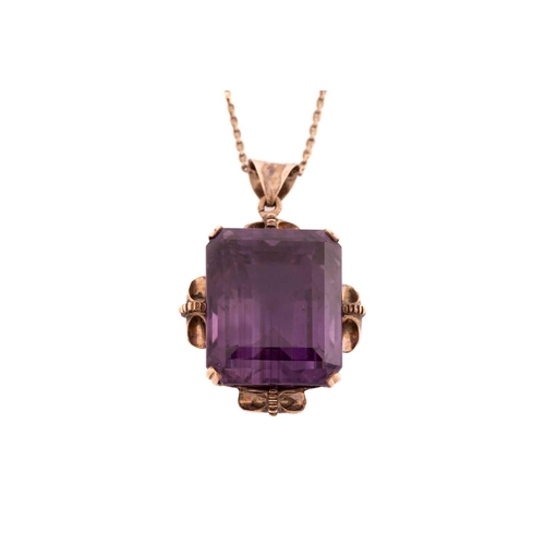 39 - A large amethyst pendant on chain, contains an octagonal step-cut amethyst of 19.6 x 15.9 x 14.2 mm,... 