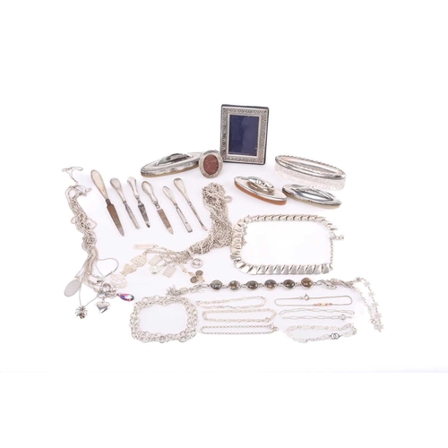 45 - A mixed collection comprising three silver-mounted nail buffs, six silver-mounted manicure tools, an... 