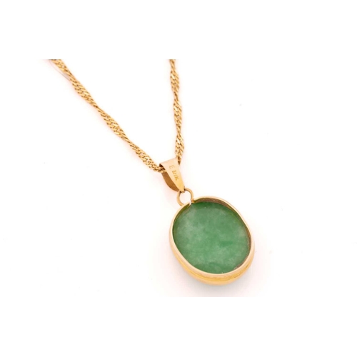 57 - A jade pendant on chain with a pair of stud earrings in 18ct yellow gold; the pendant contains an ov... 