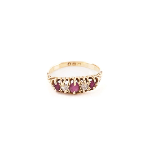 59 - A five-stone half-hoop ring set with rubies and diamonds, comprising three circular-cut rubies flank... 