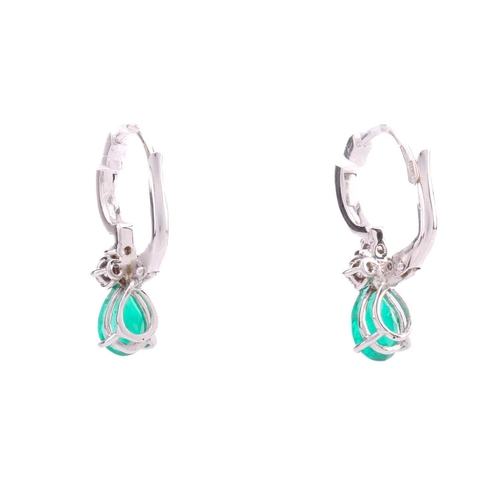 67 - A pair of emerald and diamond earrings, each containing a pear-shaped emerald of intense green body ... 