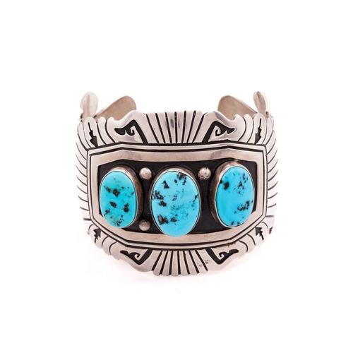 81 - A Thomas Singer cuff bracelet set with turquoise nuggets, and another turquoise line bracelet; the b... 