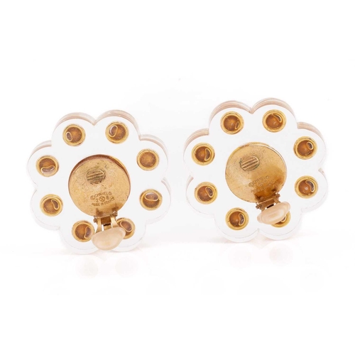 86 - Chanel - A pair of large acrylic clip-on earrings and a brooch set with rhinestones; the earrings ea... 