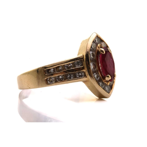 91 - A 14ct yellow gold, diamond, and ruby ring, centred with a marquise-cut ruby measuring approximately... 