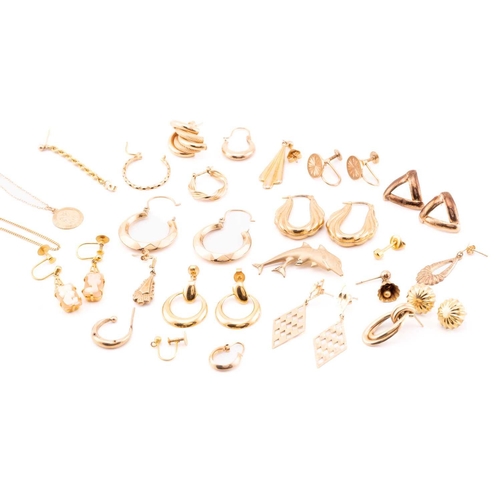 93 - A large collection of earrings, necklaces and a brooch. Comprising of eight matching yellow metal ea... 