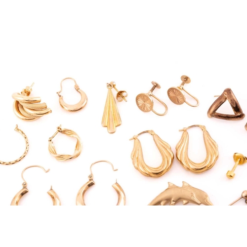 93 - A large collection of earrings, necklaces and a brooch. Comprising of eight matching yellow metal ea... 