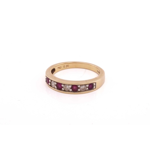 95 - A ruby and diamond seven stone half hoop eternity ring; comprising three round brilliant cut diamond... 