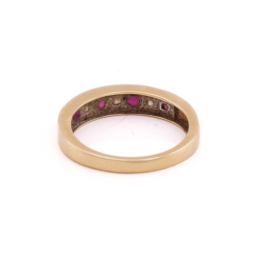 95 - A ruby and diamond seven stone half hoop eternity ring; comprising three round brilliant cut diamond... 