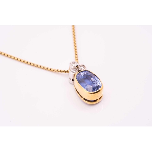 99 - A sapphire and diamond pendant on chain, the rub over set oval mixed cut sapphire, approximately 3.5... 