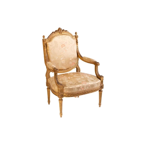 102 - In the manner of George Jacob; a Louis XVI style finely carved wood and gilt gesso fauteuil, late 19... 