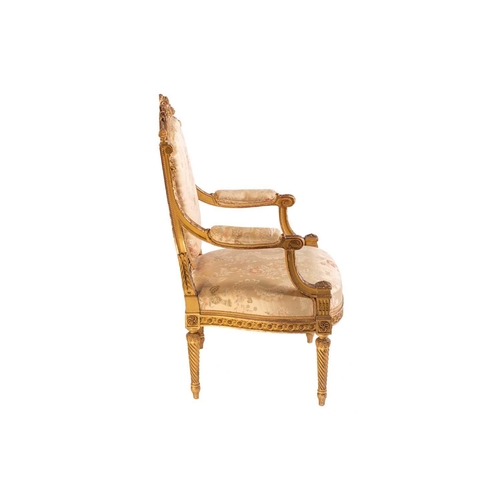 102 - In the manner of George Jacob; a Louis XVI style finely carved wood and gilt gesso fauteuil, late 19... 