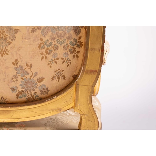 102 - In the manner of George Jacob; a Louis XVI style finely carved wood and gilt gesso fauteuil, late 19... 