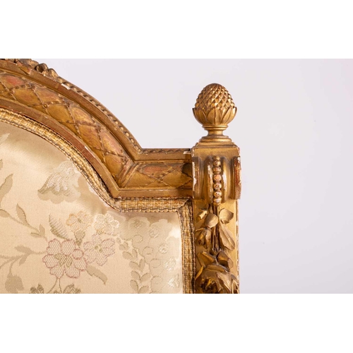 102 - In the manner of George Jacob; a Louis XVI style finely carved wood and gilt gesso fauteuil, late 19... 