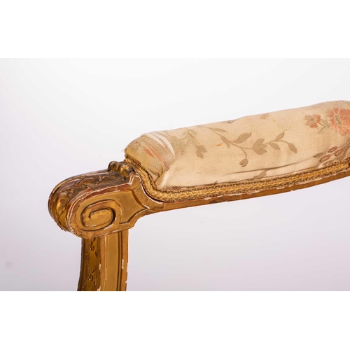 102 - In the manner of George Jacob; a Louis XVI style finely carved wood and gilt gesso fauteuil, late 19... 