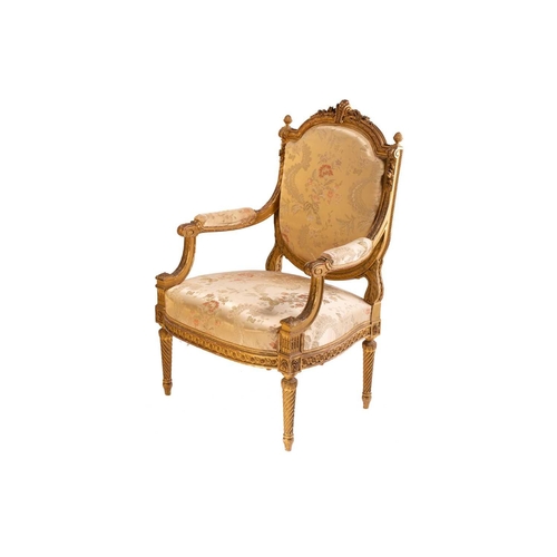 102 - In the manner of George Jacob; a Louis XVI style finely carved wood and gilt gesso fauteuil, late 19... 