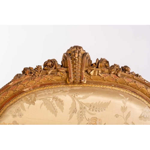 102 - In the manner of George Jacob; a Louis XVI style finely carved wood and gilt gesso fauteuil, late 19... 