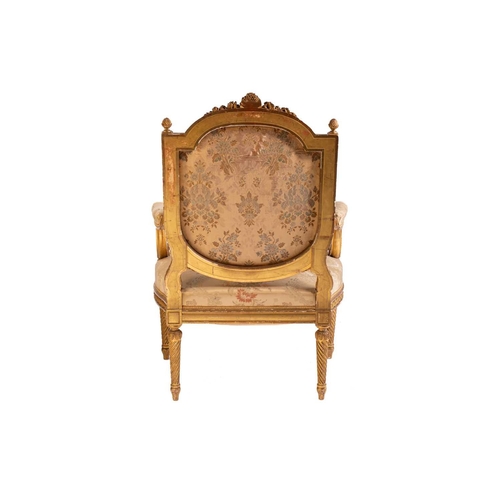 102 - In the manner of George Jacob; a Louis XVI style finely carved wood and gilt gesso fauteuil, late 19... 