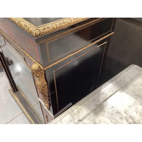 106 - A Victorian ebonized and red Boule marquetry inlaid single door pier cabinet with gilt metal caryati... 