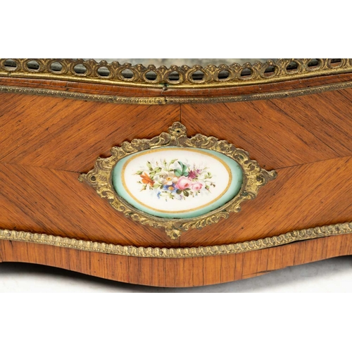 107 - A Napoleon III style king wood table jardiniere of serpentine outline, C1900, with gilt metal handle... 